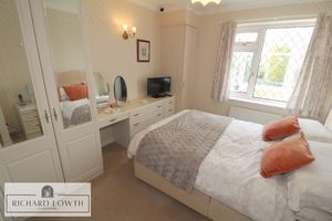 Bedroom One- click for photo gallery